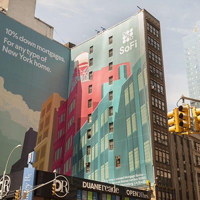 An advertisement for SoFi, a fintech personal finance startup, above a busy intersection in New York promotes their mortgage offerings, seen on Sunday, August 27, 2017.