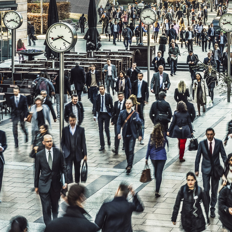 Commuters rushing to work across Reuters Square