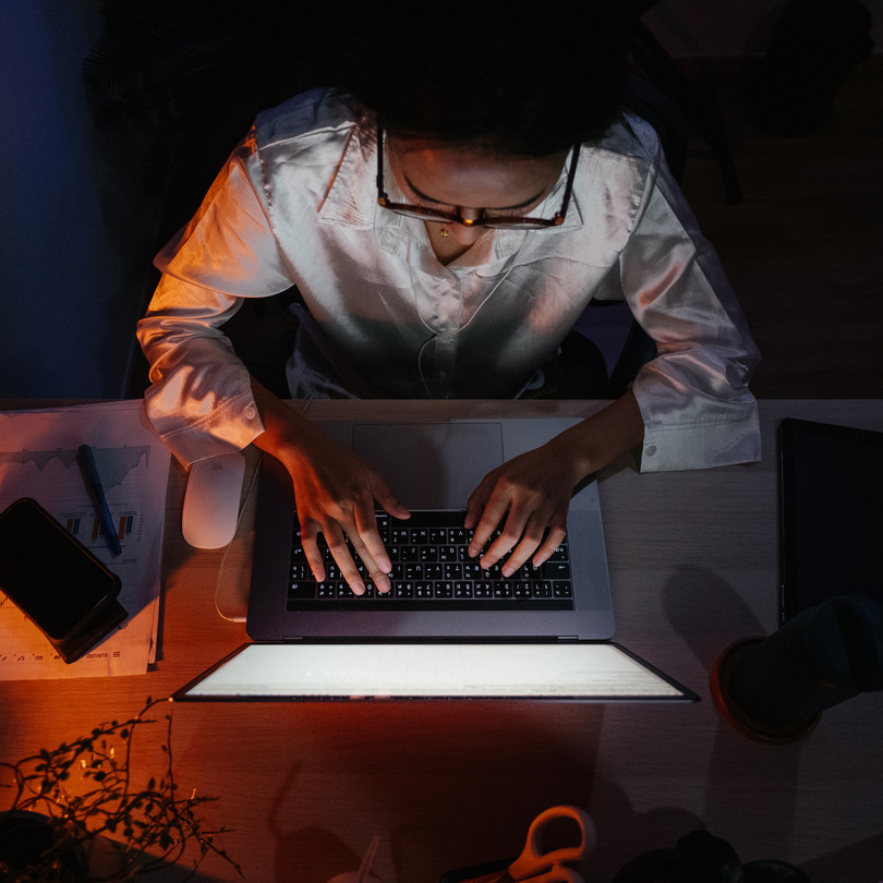 Woman working late from home